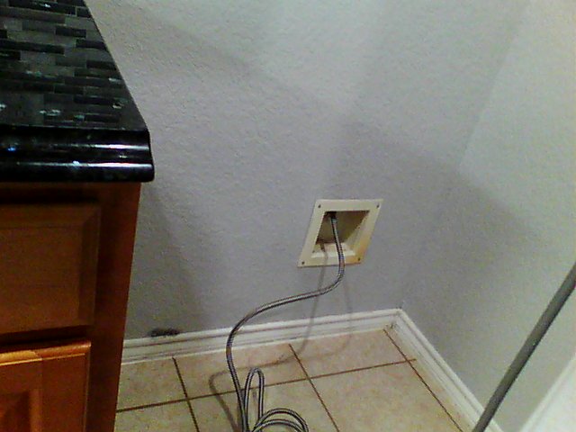 Visible wall with hidden water damage that requires thermal imaging to detect